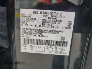 2013 Ford F-150 XL with VIN 1FTFX1EF7DFA59025, listed as a Copart auction lot 55050095 with 102,067 mi miles and Salvage Title. Bid and sale history available at DreamBid. Image 12.