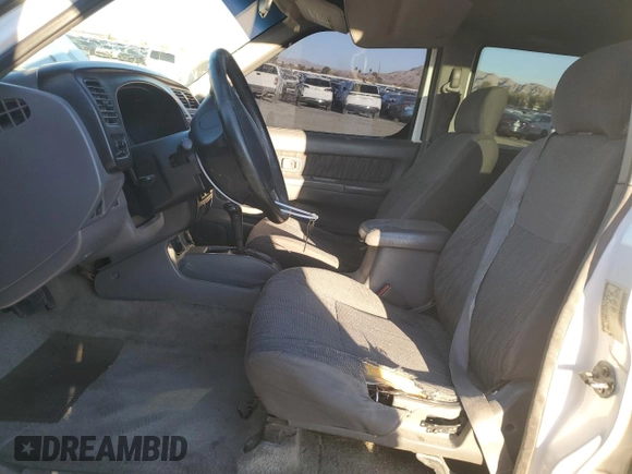 2000 Nissan Frontier XE z VIN 1N6ED27T3YC422129, wystawiony jako Copart lot #46668975 z przebiegiem 333 836 mil mil oraz Szkoda całkowita • Salvage title. Historia ofert i sprzedaży dostępna na DreamBid. Obrazek 7.
