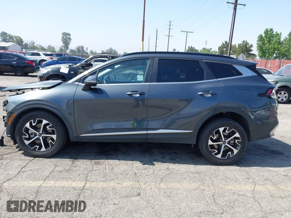2023 Kia Sportage EX with VIN KNDPVCAG4P7014112, listed as a IAAI auction lot 42610022 with 50,680 mi miles and . Bid and sale history available at DreamBid. Image 15.