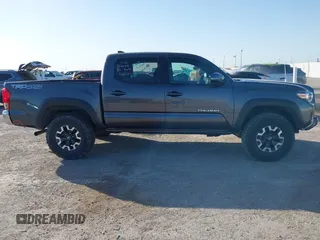 2017 Toyota Tacoma SR5 with VIN 5TFCZ5AN5HX077315, listed as a IAAI auction lot 42017639 with 74,999 mi miles and . Bid and sale history available at DreamBid. Image 13.