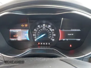 2016 Ford Fusion Titanium with VIN 3FA6P0K96GR390989, listed as a IAAI auction lot 42634275 with 123,559 mi miles and . Bid and sale history available at DreamBid. Image 7.