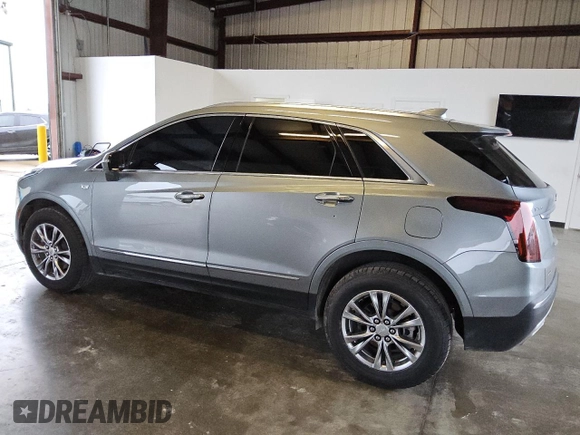 2023 Cadillac XT5 AWD Premium Luxury with VIN 1GYKNDR49PZ222592, listed as a Copart auction lot 79759624 with 32,177 mi miles and Clean Title. Bid and sale history available at DreamBid. Image 2.