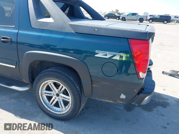 2005 Chevrolet Avalanche Z71 with VIN 3GNEK12Z95G177934, listed as a IAAI auction lot 42645320 with 195,523 mi miles and . Bid and sale history available at DreamBid. Image 13.