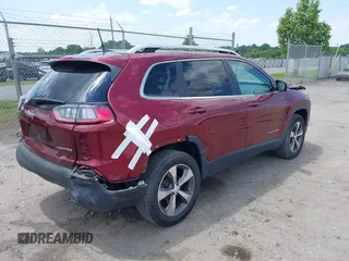 2019 Jeep Cherokee Limited with VIN 1C4PJMDXXKD323087, listed as a IAAI auction lot 42471210 with 57,839 mi miles and . Bid and sale history available at DreamBid. Image 4.