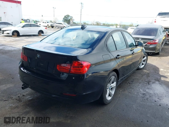 2015 BMW 3 Series 328i with VIN WBA3C1C53FK119723, listed as a IAAI auction lot 41871200 with 112,552 mi miles and . Bid and sale history available at carsss.com. Image 4.