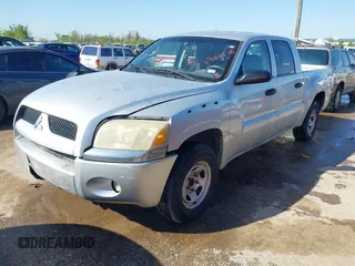 2007 Mitsubishi Raider LS with VIN 1Z7HC28K57S161586, listed as a IAAI auction lot 41864742 with 212,817 mi miles. Bid and sale history available at carsss.com. Image 2.
