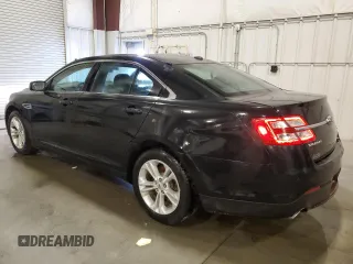2014 Ford Taurus SEL z VIN 1FAHP2E82EG186640, wystawiony jako Copart lot #55820205 z przebiegiem 194 843 mil mil oraz Czysty tytuł • Clean title. Historia ofert i sprzedaży dostępna na DreamBid. Obrazek 2.