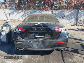 2014 Maserati Ghibli S Q4 z VIN ZAM57RTA9E1106695, wystawiony jako IAAI lot #40783416 z przebiegiem 92 885 mil mil oraz . Historia ofert i sprzedaży dostępna na DreamBid. Obrazek 16.