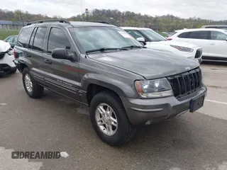 2004 Jeep Grand Cherokee Laredo z VIN 1J4GW48S04C348826, wystawiony jako IAAI lot #41933855 z przebiegiem 128 981 mil mil oraz . Historia ofert i sprzedaży dostępna na DreamBid. Obrazek 1.