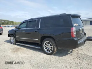 2015 GMC Yukon XL Denali with VIN 1GKS2JKJ5FR243343, listed as a Copart auction lot 51352125 with 142,996 mi miles and Salvage Title. Bid and sale history available at DreamBid. Image 2.