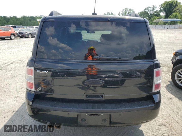 2012 Ford Flex SE z VIN 2FMGK5BC4CBD22541, wystawiony jako Copart lot #55414435 z przebiegiem 142 900 mil mil oraz Szkody całkowita. Historia ofert i sprzedaży dostępna na DreamBid. Obrazek 6.