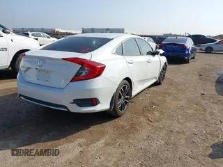 2020 Honda Civic LX z VIN 2HGFC2F68LH565560, wystawiony jako IAAI lot #41517853 z przebiegiem 96 832 mil mil oraz . Historia ofert i sprzedaży dostępna na DreamBid. Obrazek 4.