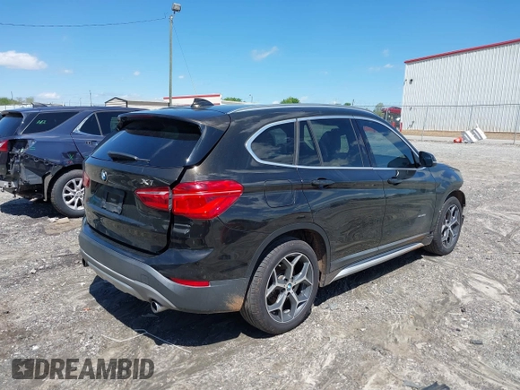 2016 BMW X1 xDrive28i with VIN WBXHT3C3XGP889833, listed as a IAAI auction lot 39118131 with 111,343 mi miles. Bid and sale history available at carsss.com. Image 4.