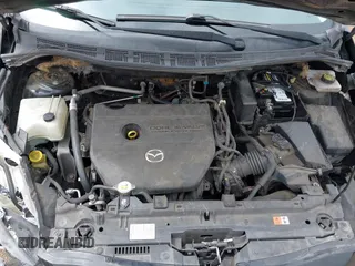 2015 Mazda 5 Sport с VIN JM1CW2BL2F0185045, выставлен на аукционе IAAI как лот 42487509 с пробегом 164 978 миль миль и . История ставок и продаж доступна на DreamBid. Изображение 10.