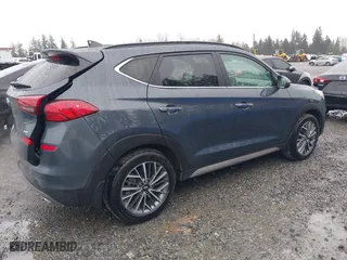 2021 Hyundai Tucson Sport with VIN KM8J3CAL0MU287789, listed as a IAAI auction lot 41848291 with 39,457 mi miles. Bid and sale history available at carsss.com. Image 4.