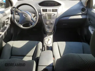 2009 Toyota Yaris z VIN JTDBT903891317448, wystawiony jako Copart lot #56153315 z przebiegiem 209 441 mil mil oraz Szkoda całkowita • Salvage title. Historia ofert i sprzedaży dostępna na DreamBid. Obrazek 8.