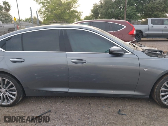 2021 Cadillac CT5 Premium Luxury z VIN 1G6DN5RK3M0146941, wystawiony jako IAAI lot #41934950 z przebiegiem Nie podano mil oraz . Historia ofert i sprzedaży dostępna na DreamBid. Obrazek 14.