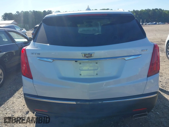 2017 Cadillac XT5 Luxury FWD with VIN 1GYKNBRS1HZ304062, listed as a IAAI auction lot 42460981 with 77,310 mi miles and . Bid and sale history available at DreamBid. Image 16.