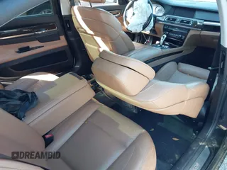 2012 BMW 7 Series 750Li xDrive with VIN WBAKC8C53CC435553, listed as a IAAI auction lot 41852097 with 127,418 mi miles and . Bid and sale history available at DreamBid. Image 8.