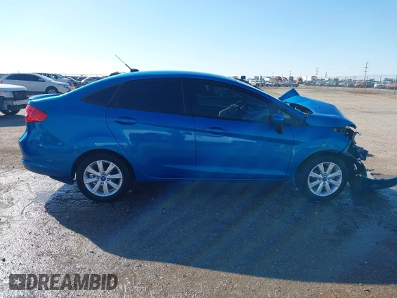 2012 Ford Fiesta SE with VIN 3FADP4BJ2CM115295, listed as a IAAI auction lot 41609949 with Not Provided miles. Bid and sale history available at carsss.com. Image 14.