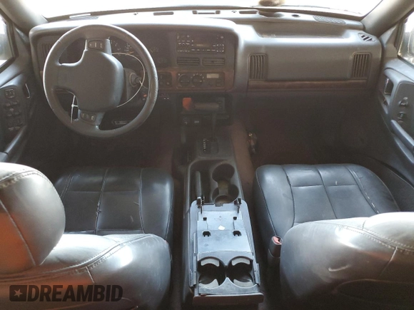 1996 Jeep Grand Cherokee with VIN 1J4EZ78Y9TC104398, listed as a Copart auction lot 69706254 with Not provided miles and Salvage title. Bid and sale history available at DreamBid. Image 8.