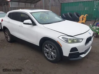2022 BMW X2 sDrive28i with VIN WBXYH9C04N5U25732, listed as a IAAI auction lot 41015169 with 65,526 mi miles. Bid and sale history available at carsss.com. Image 1.