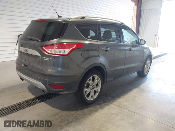 2016 Ford Escape Titanium with VIN 1FMCU9J9XGUC30596, listed as a IAAI auction lot 42024166 with 179,340 mi miles. Bid and sale history available at carsss.com. Image 4.