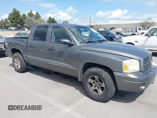2006 Dodge Dakota SLT with VIN 1D7HW48NX6S503353, listed as a IAAI auction lot 41927785 with 160,750 mi miles. Bid and sale history available at carsss.com. Image 1.