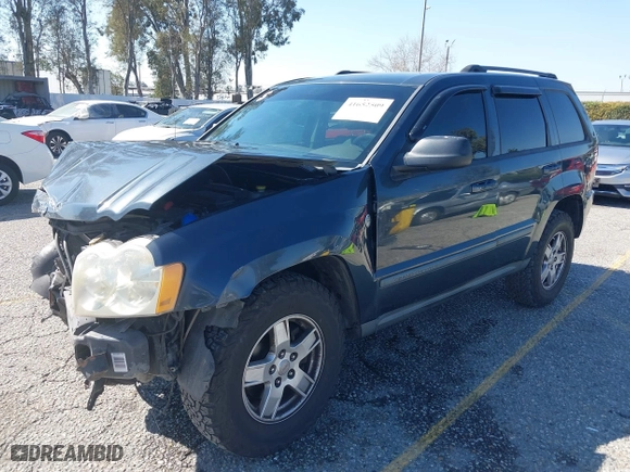 2007 Jeep Grand Cherokee Laredo with VIN 1J8HR48PX7C660601, listed as a IAAI auction lot 41652509 with 131,556 mi miles. Bid and sale history available at carsss.com. Image 2.
