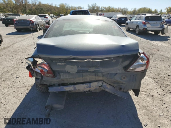 2000 Ford Taurus SE with VIN 1FAFP53U3YG259124, listed as a Copart auction lot 77363344 with 154,889 mi miles and Salvage Title. Bid and sale history available at DreamBid. Image 6.