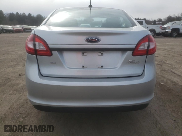 2012 Ford Fiesta SE with VIN 3FADP4BJ3CM114043, listed as a Copart auction lot 46254685 with 58,457 mi miles and Clean Title. Bid and sale history available at DreamBid. Image 6.