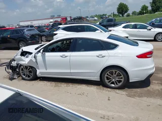 2020 Ford Fusion SEL with VIN 3FA6P0CD3LR152711, listed as a IAAI auction lot 42516763 with 97,073 mi miles and . Bid and sale history available at DreamBid. Image 14.
