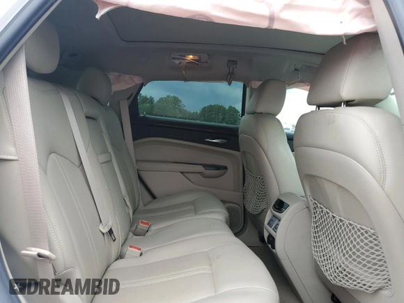 2013 Cadillac SRX Premium Collection with VIN 3GYFNEE32DS644426, listed as a Copart auction lot 59775625 with 106,240 mi miles and Salvage title. Bid and sale history available at DreamBid. Image 11.