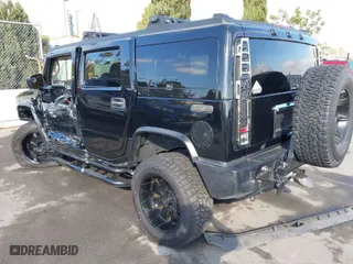 2004 Hummer H2 with VIN 5GRGN23U14H113472, listed as a IAAI auction lot 41390553 with NaN miles. Bid and sale history available at carsss.com. Image 3.