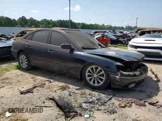2006 Hyundai Azera SE z VIN KMHFC46F56A035393, wystawiony jako Copart lot #63339195 z przebiegiem Nie podano mil oraz Szkoda całkowita • Salvage title. Historia ofert i sprzedaży dostępna na DreamBid. Obrazek 4.