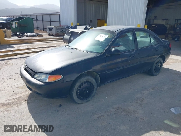 1998 Ford Escort LX z VIN 1FAFP10P5WW237944, wystawiony jako IAAI lot #42239266 z przebiegiem 238 540 mil mil oraz . Historia ofert i sprzedaży dostępna na DreamBid. Obrazek 2.