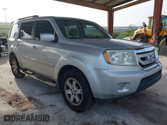 2009 Honda Pilot Touring z VIN 5FNYF38839B022943, wystawiony jako IAAI lot #42443006 z przebiegiem 199 184 mil mil oraz . Historia ofert i sprzedaży dostępna na DreamBid. Obrazek 1.