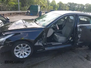 2014 Cadillac CTS RWD with VIN 1G6AP5SX9E0134183, listed as a IAAI auction lot 42190674 with 59,603 mi miles and . Bid and sale history available at DreamBid. Image 6.