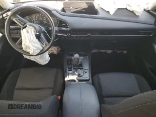 2023 Mazda CX-30 S with VIN 3MVDMBAM0PM506565, listed as a Copart auction lot 57699125 with 7,345 mi miles and Salvage title. Bid and sale history available at DreamBid. Image 8.