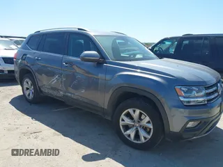 2018 Volkswagen Atlas SE with VIN 1V2CR2CA2JC576397, listed as a IAAI auction lot 41959708 with 168,619 mi miles and . Bid and sale history available at DreamBid. Image 1.