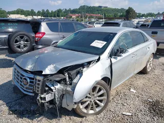 2013 Cadillac XTS Luxury z VIN 2G61R5S38D9228339, wystawiony jako IAAI lot #42664948 z przebiegiem 105 917 mil mil oraz . Historia ofert i sprzedaży dostępna na DreamBid. Obrazek 18.