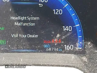 2021 Toyota Corolla Hybrid LE with VIN JTDEAMDEXMJ018053, listed as a IAAI auction lot 41779462 with 60,794 mi miles. Bid and sale history available at carsss.com. Image 16.