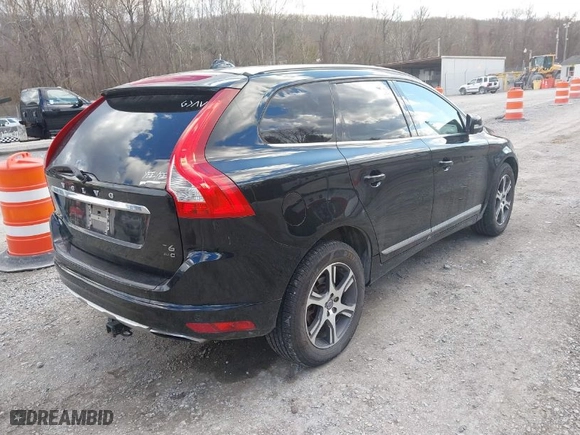 2015 Volvo XC60 T6 with VIN YV4902RK1F2731585, listed as a IAAI auction lot 41669105 with NaN miles. Bid and sale history available at carsss.com. Image 4.