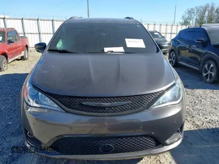 2020 Chrysler Pacifica Touring with VIN 2C4RC1FG1LR245764, listed as a IAAI auction lot 40646472 with 86,119 mi miles and . Bid and sale history available at DreamBid. Image 12.