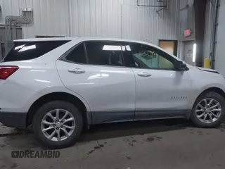 2019 Chevrolet Equinox LT z VIN 2GNAXUEV2K6258730, wystawiony jako IAAI lot #41429824 z przebiegiem 72 435 mil mil oraz . Historia ofert i sprzedaży dostępna na DreamBid. Obrazek 13.