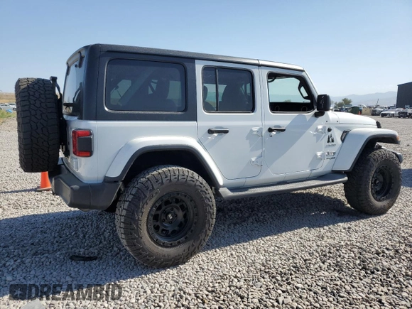 2018 Jeep Wrangler Unlimited Sahara with VIN 1C4HJXEG6JW112198, listed as a Copart auction lot 63412775 with 34,853 mi miles and Salvage title. Bid and sale history available at DreamBid. Image 3.