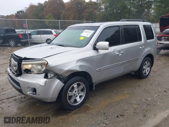 2010 Honda Pilot Touring with VIN 5FNYF3H89AB005861, listed as a IAAI auction lot 40828747 with 275,757 mi miles and . Bid and sale history available at DreamBid. Image 19.