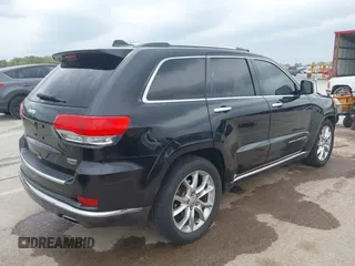 2015 Jeep Grand Cherokee Summit z VIN 1C4RJFJT0FC674494, wystawiony jako IAAI lot #42056835 z przebiegiem 143 969 mil mil oraz . Historia ofert i sprzedaży dostępna na DreamBid. Obrazek 4.
