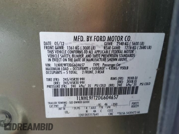 2013 Lincoln MKS EcoBoost with VIN 1LNHL9FT2DG604657, listed as a Copart auction lot 65357735 with 133,548 mi miles and Salvage title. Bid and sale history available at DreamBid. Image 12.