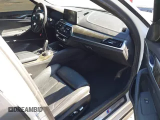 2020 BMW 5 Series 530e with VIN WBAJA9C02LCD31800, listed as a IAAI auction lot 41669765 with 99,024 mi miles and . Bid and sale history available at DreamBid. Image 5.